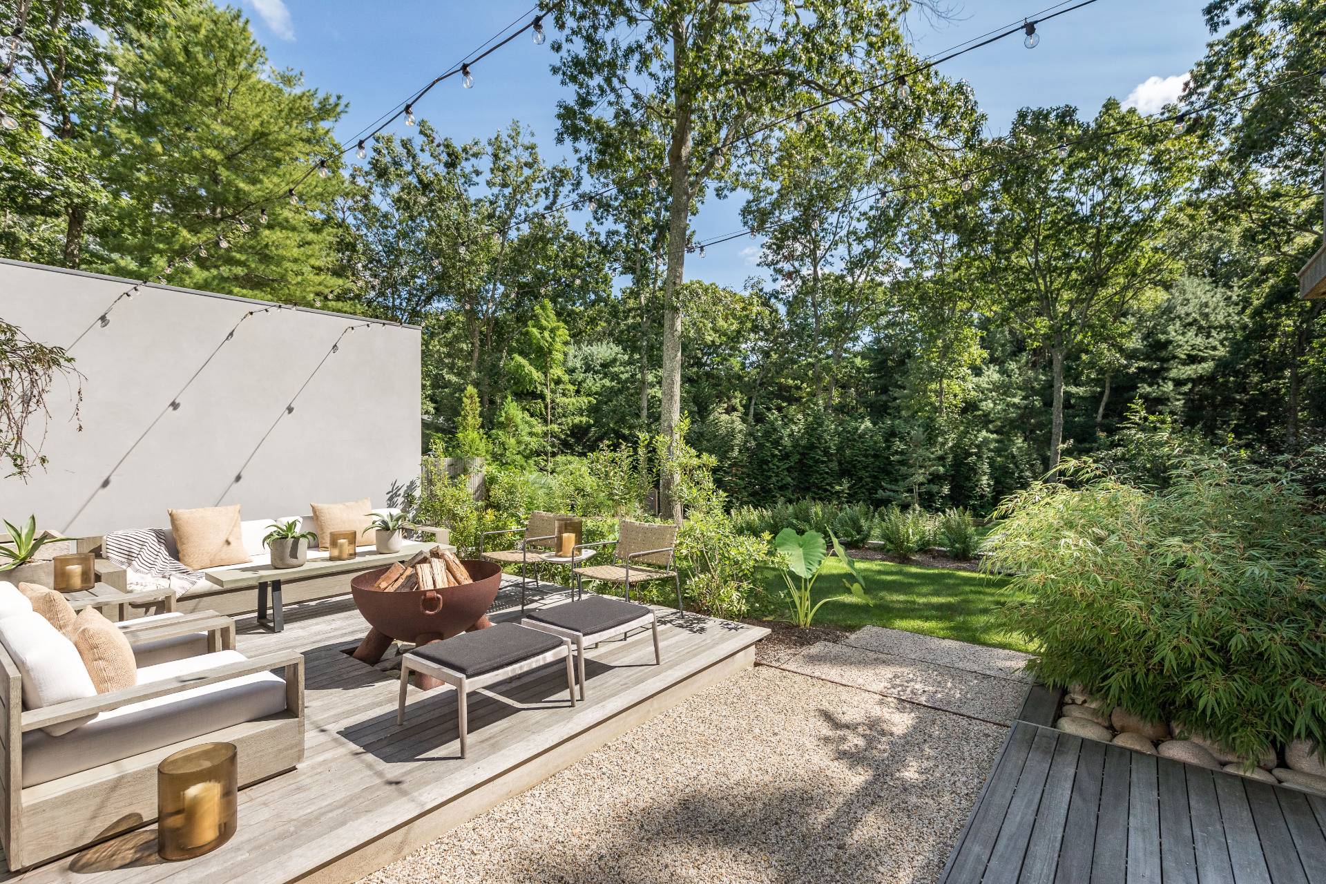 216 Bull Path East Hampton, NY 11937 - Photo 27 of 30 an outdoor space with furniture and garden