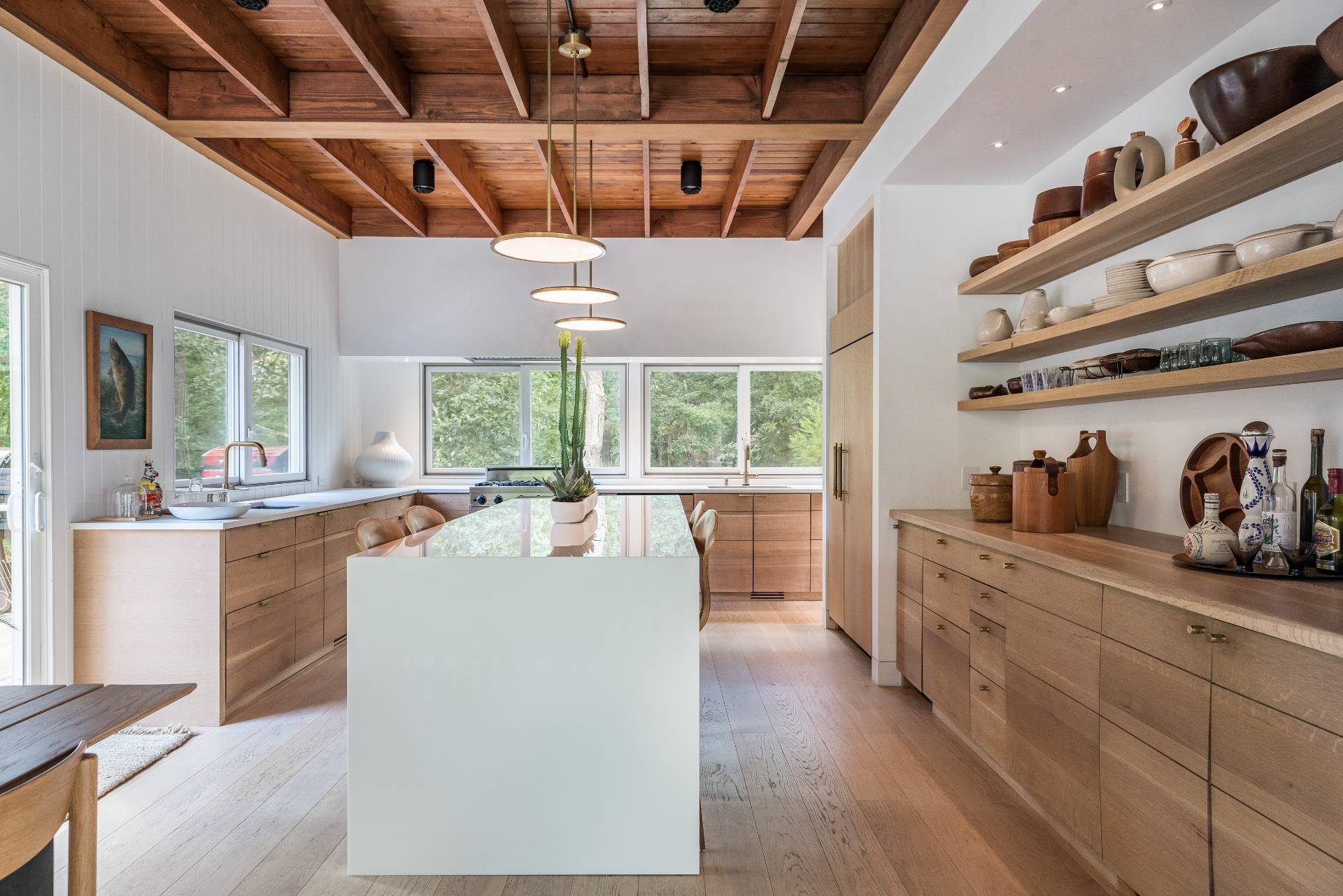 216 Bull Path East Hampton, NY 11937 - Photo 8 of 30 a large white kitchen with lots of counter top space
