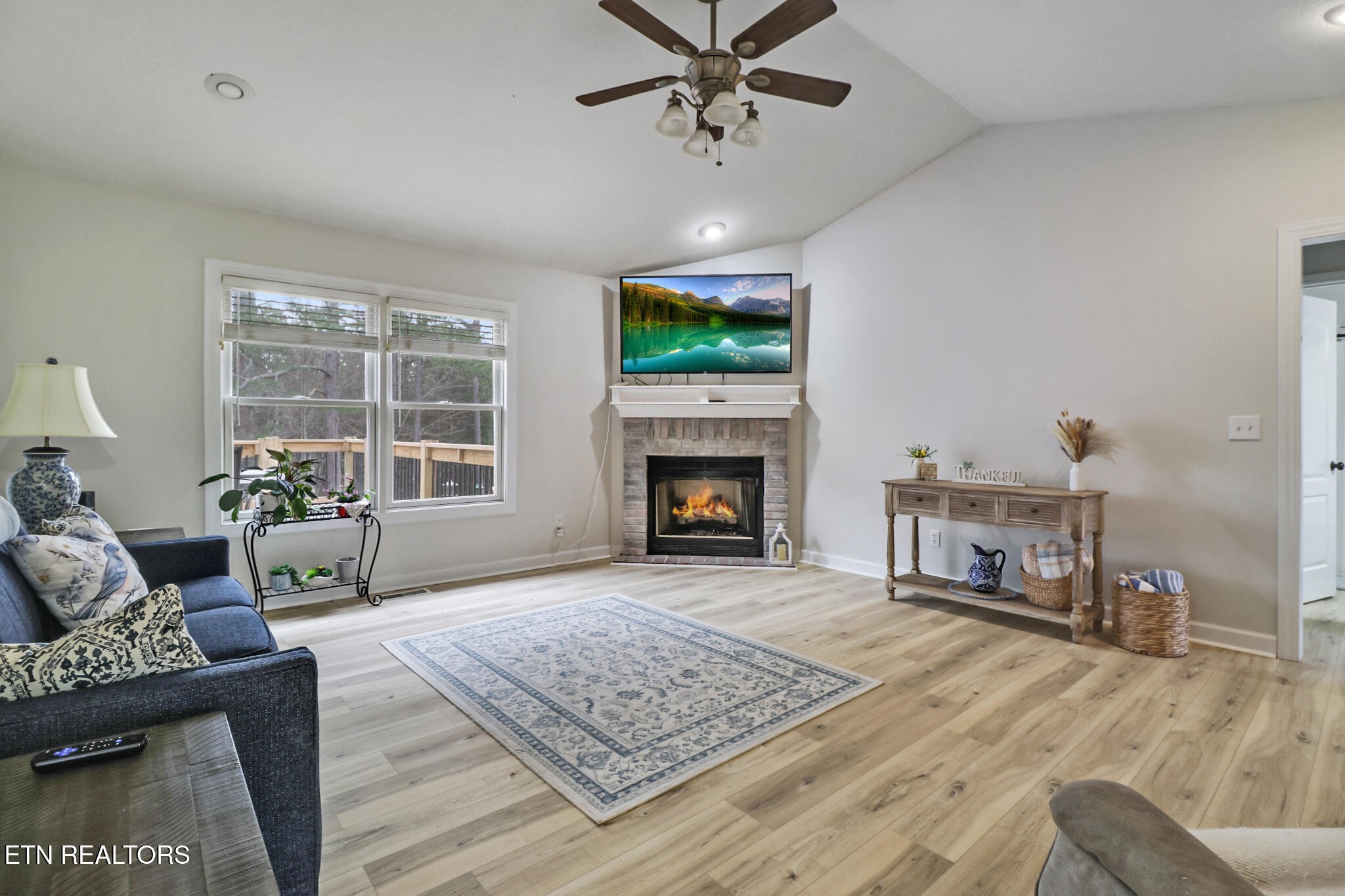 93 Tower Way Allardt, TN 38504 - Photo 11 of 40 a living room with furniture and a fireplace