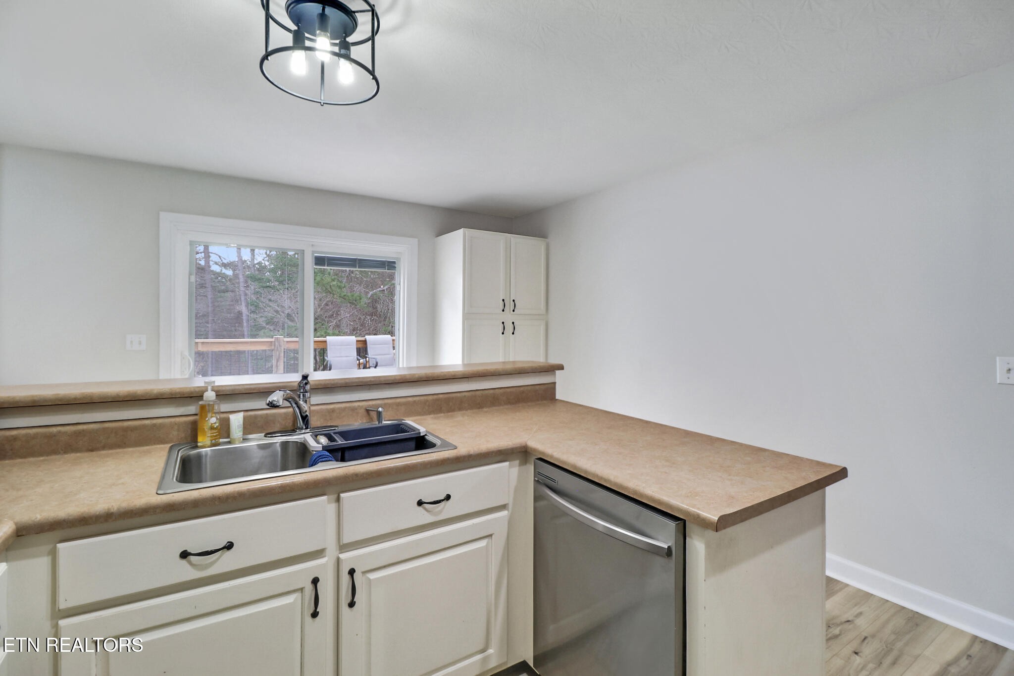 93 Tower Way Allardt, TN 38504 - Photo 22 of 40 a kitchen with a sink and cabinets