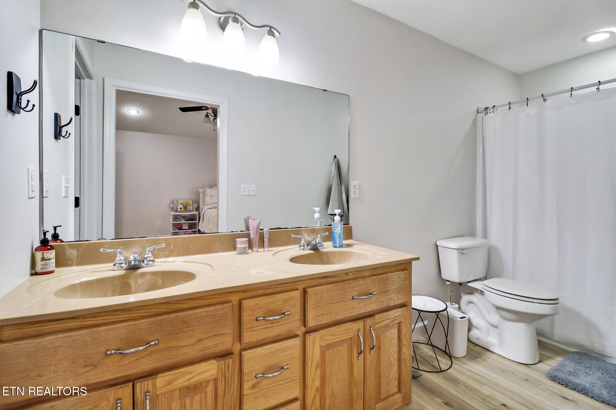 93 Tower Way Allardt, TN 38504 - Photo 27 of 40 a bathroom with a granite countertop sink toilet and shower