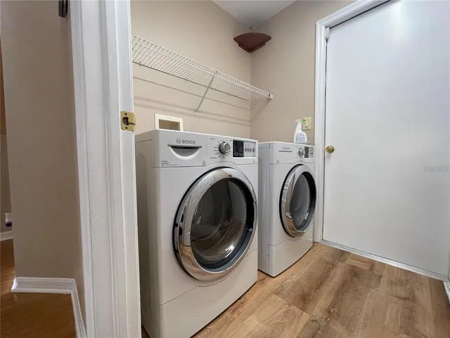 a utility room with dryer and washer