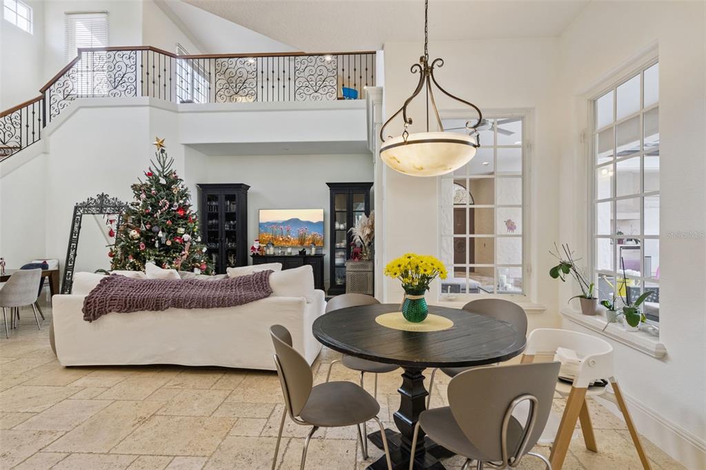 103 Acadia Terrace Celebration, FL 34747 - Photo 13 of 87 a view of a dining room with furniture and a chandelier
