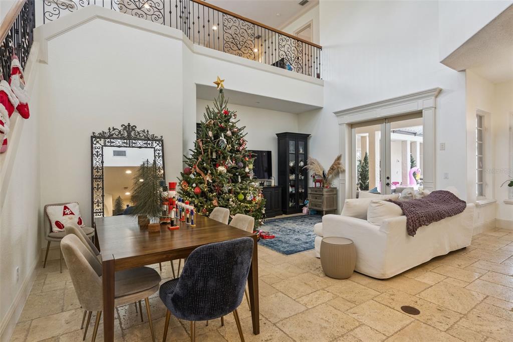 103 Acadia Terrace Celebration, FL 34747 - Photo 14 of 87 a living room with furniture and flowers