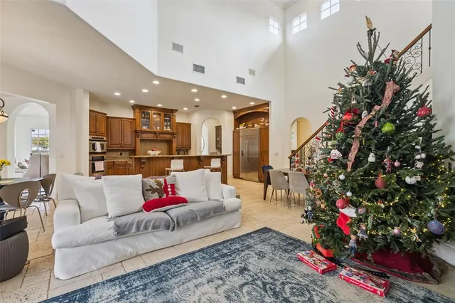 a kitchen with stainless steel appliances a sink stove and cabinets