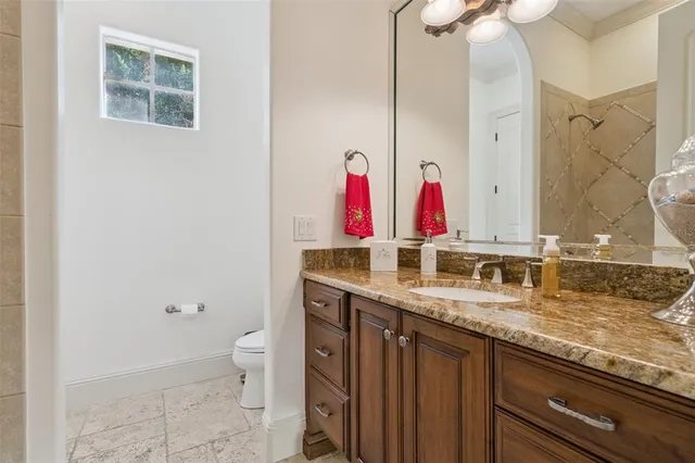 a bedroom with a bed and closet