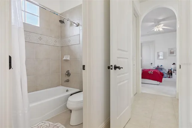 a view of multiple houses with palm trees