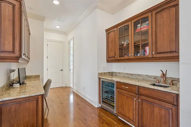 an aerial view of residential building and lake