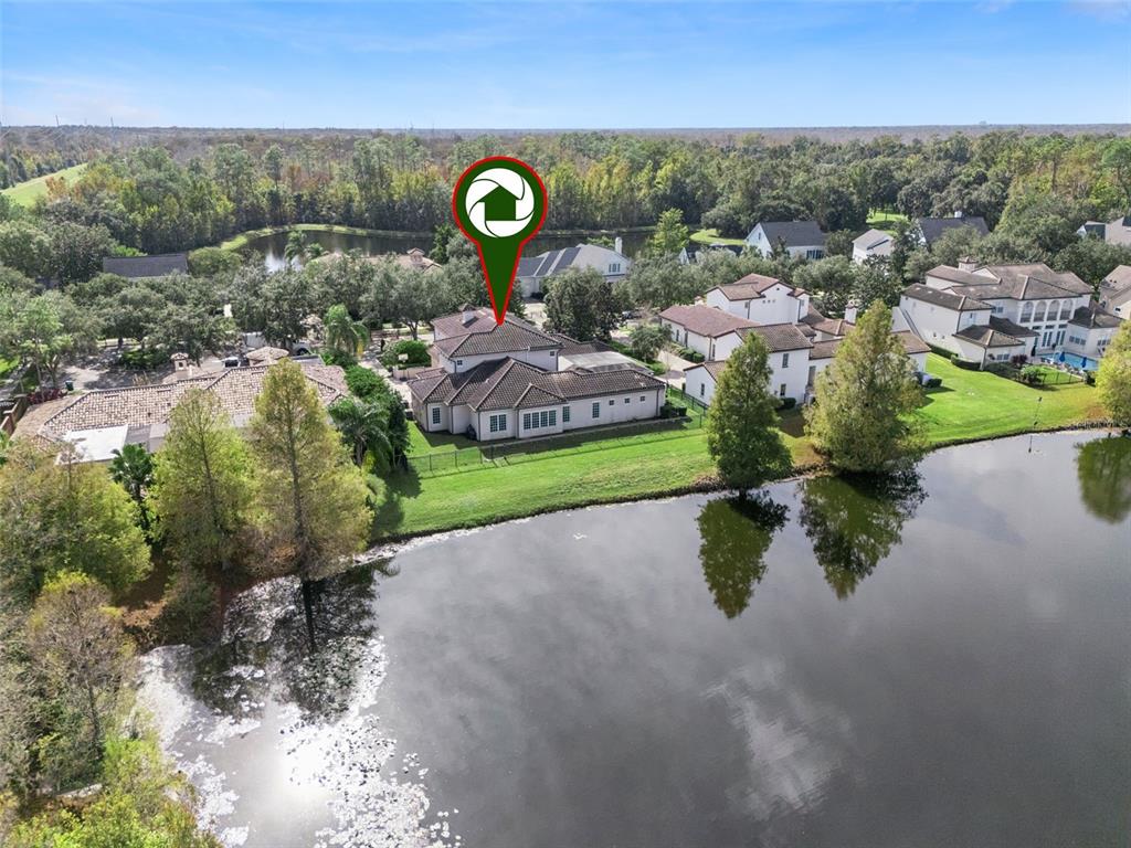 103 Acadia Terrace Celebration, FL 34747 - Photo 69 of 87 an aerial view of a house with a garden