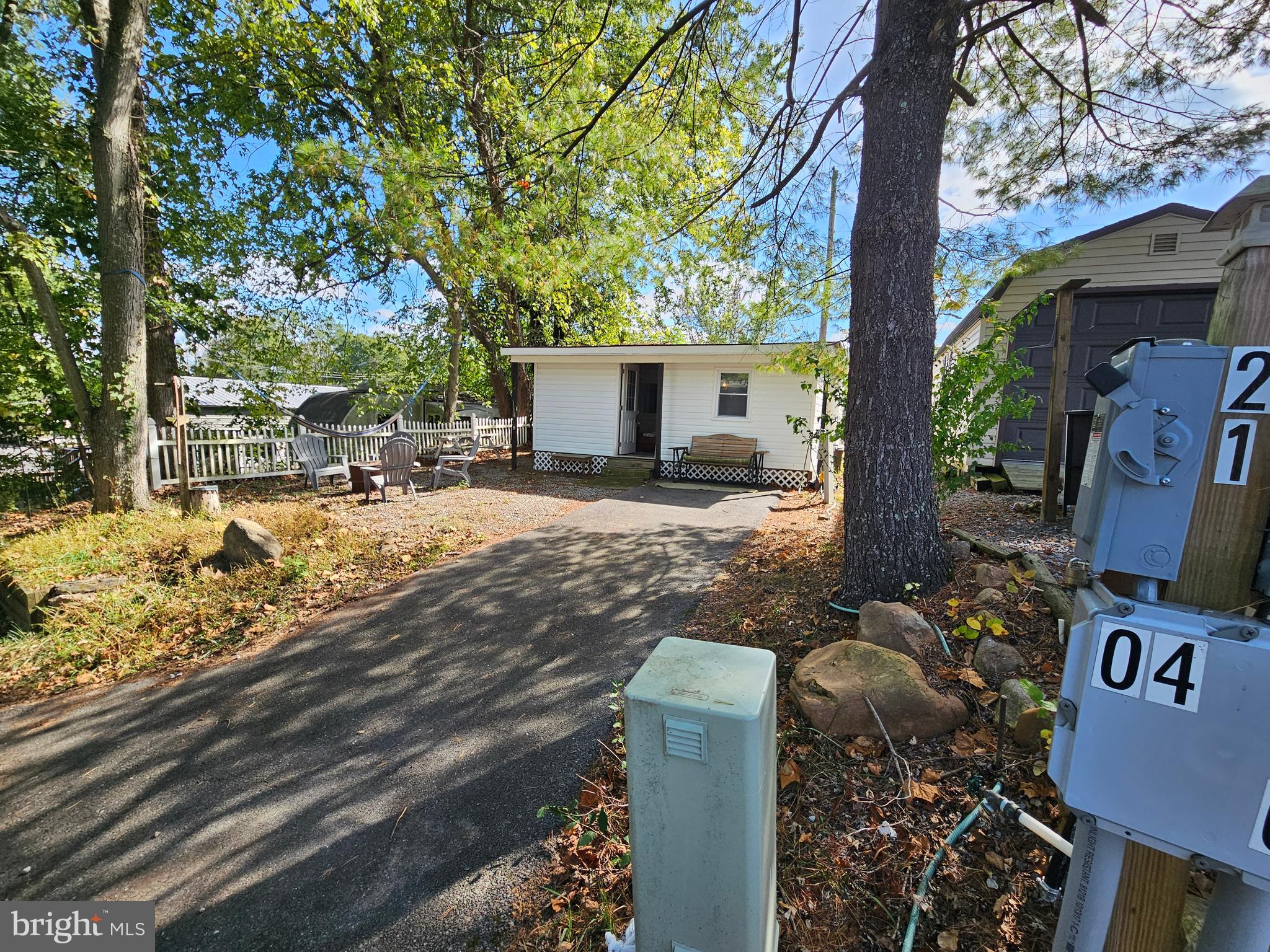 4 Old Faceful Street Falling Waters, WV 25419 - Photo 4 of 32 a view of a house with backyard and a tree