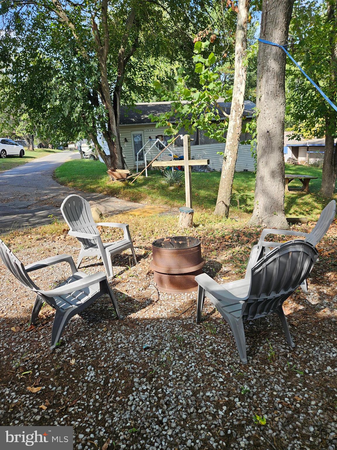 4 Old Faceful Street Falling Waters, WV 25419 - Photo 5 of 32 a view of backyard with swimming pool and outdoor seating