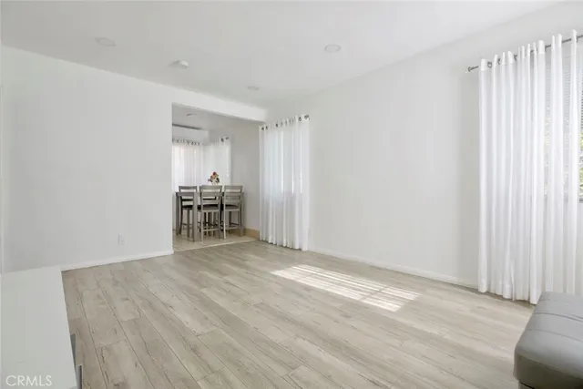 a view of livingroom with furniture and wooden floor