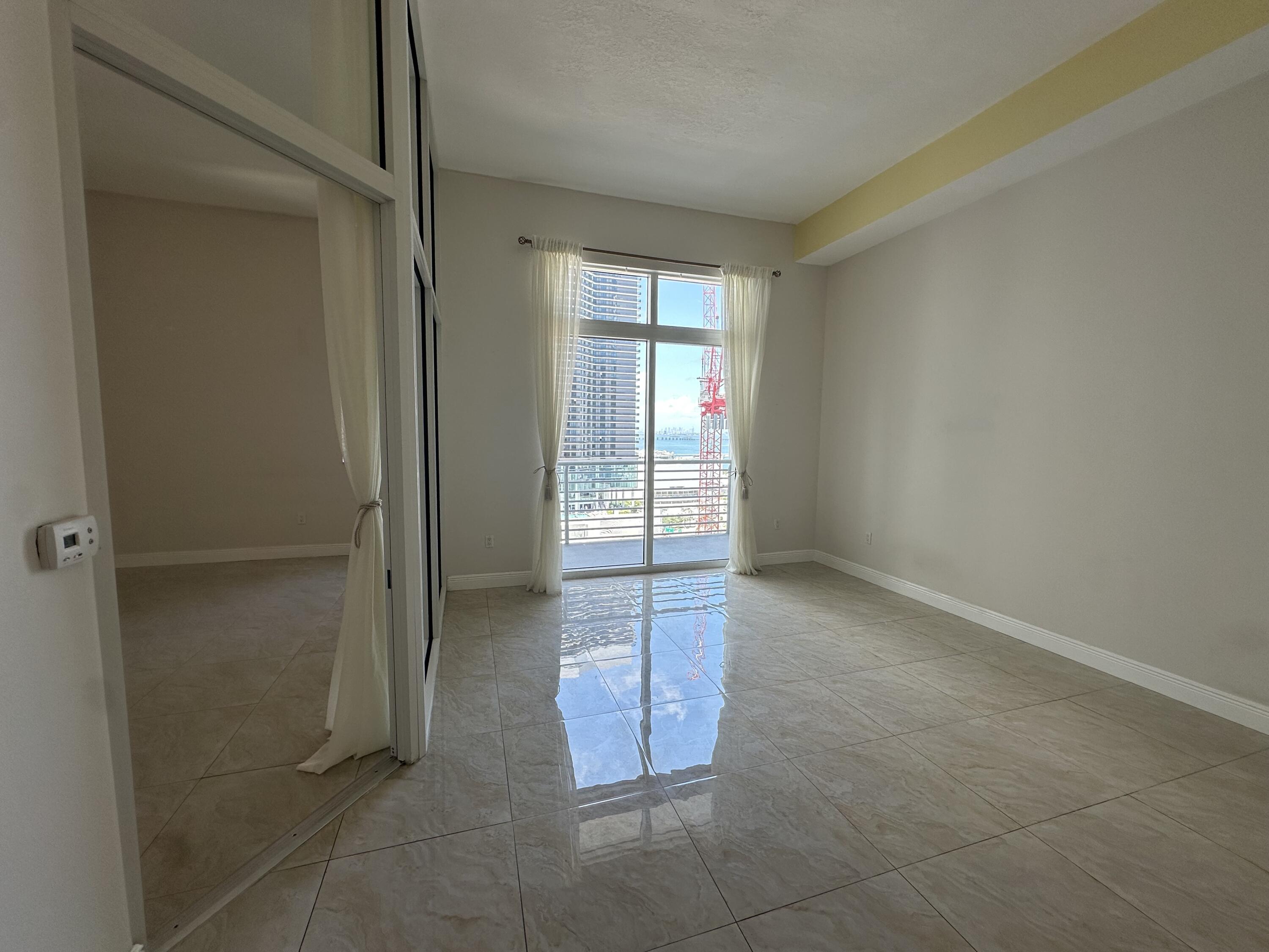 234 Northeast 3rd Street, Unit UPH06 Miami, FL 33132 - Photo 4 of 12 IMG_6243
