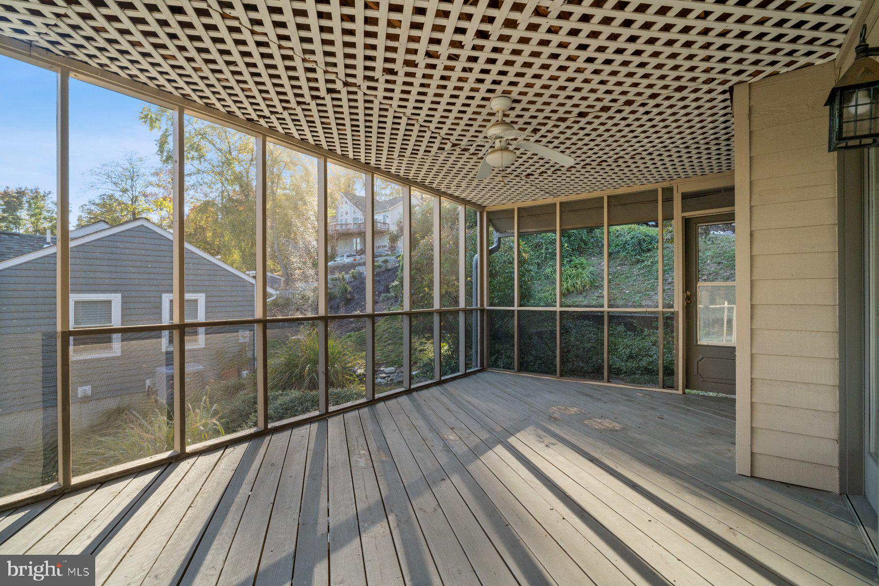 6949 Meadowlake Road New Market, MD 21774 - Photo 8 of 51 Huge screened in porch off kitchen & Dining.