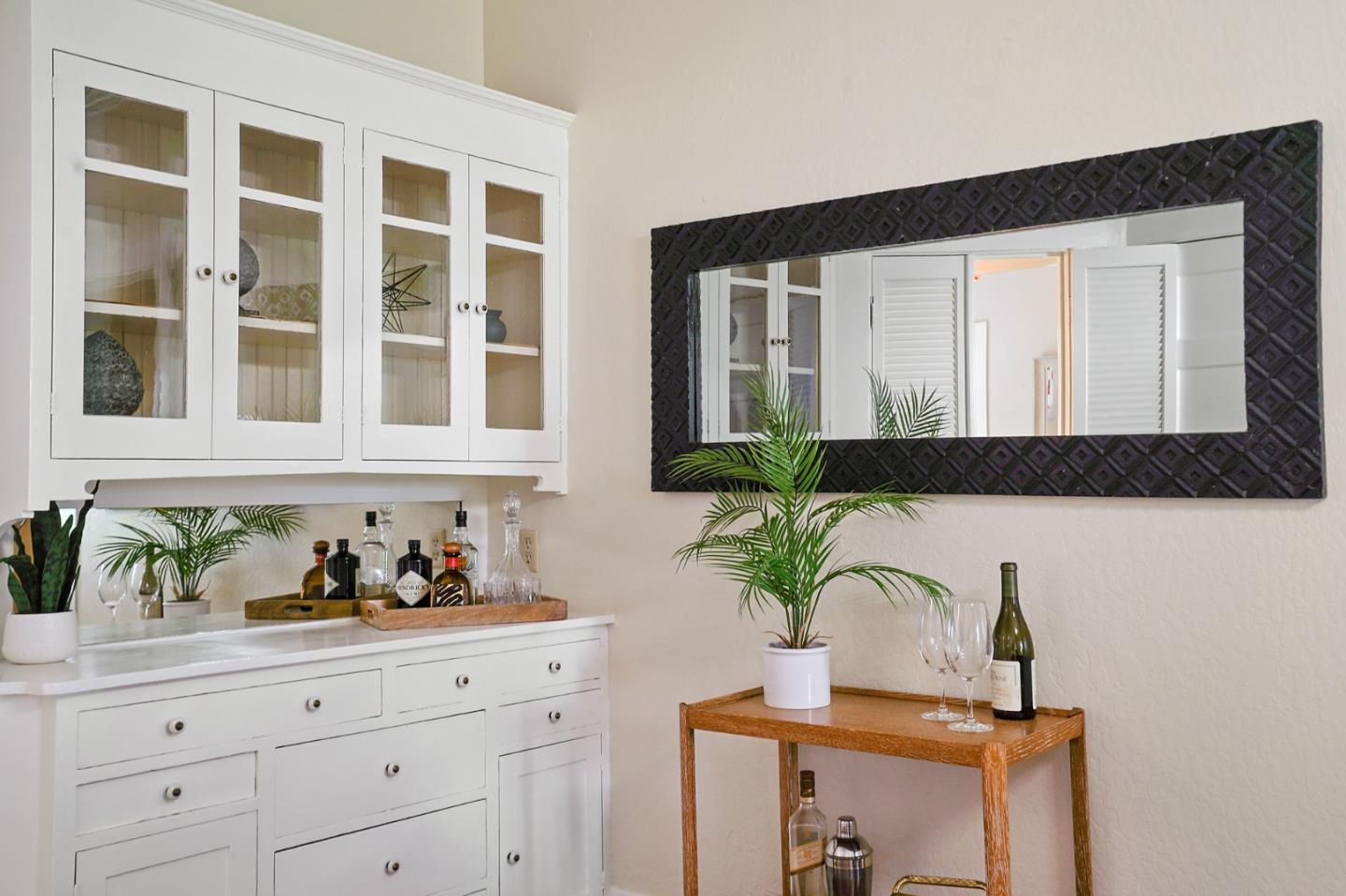 151 Melville Avenue Palo Alto, CA 94301 - Photo 11 of 51 a bathroom with a sink and a mirror