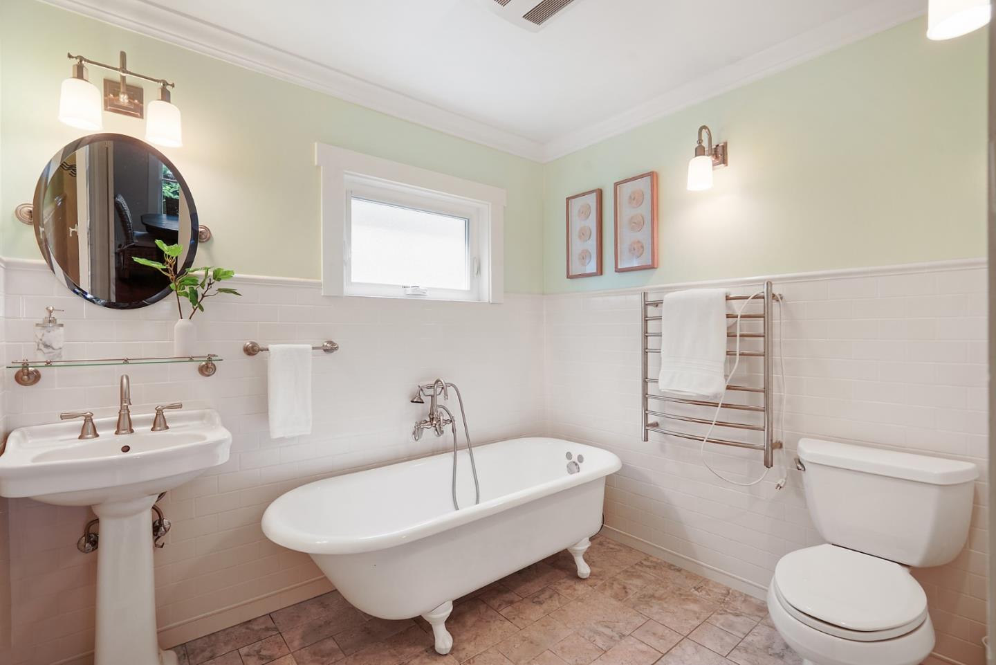 151 Melville Avenue Palo Alto, CA 94301 - Photo 22 of 51 a bathroom with a toilet a sink and bathtub