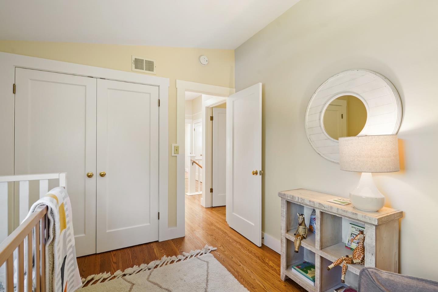 151 Melville Avenue Palo Alto, CA 94301 - Photo 27 of 51 a view of a livingroom with furniture and wooden floor