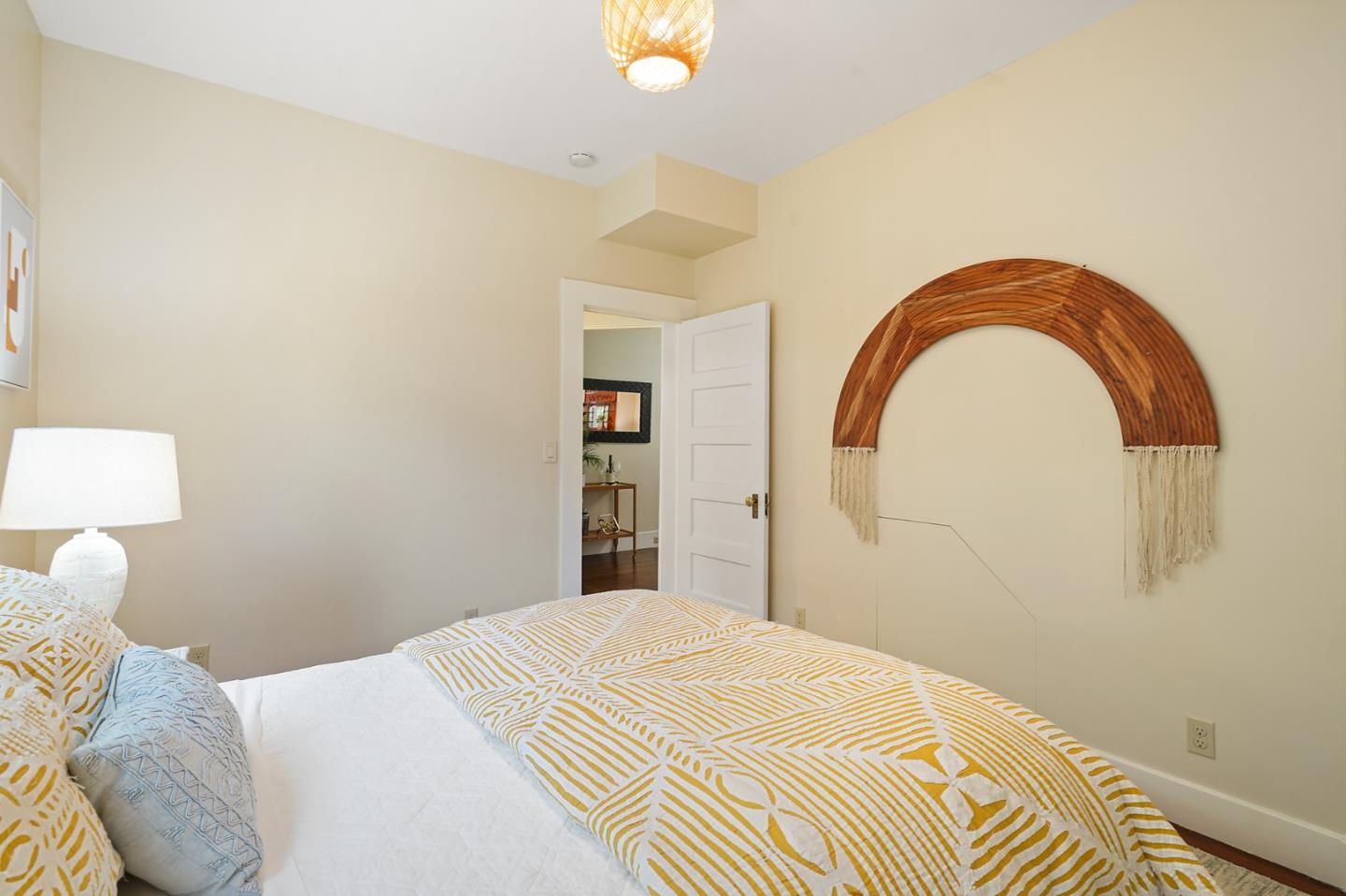 151 Melville Avenue Palo Alto, CA 94301 - Photo 28 of 51 a bedroom with a bed and a chandelier