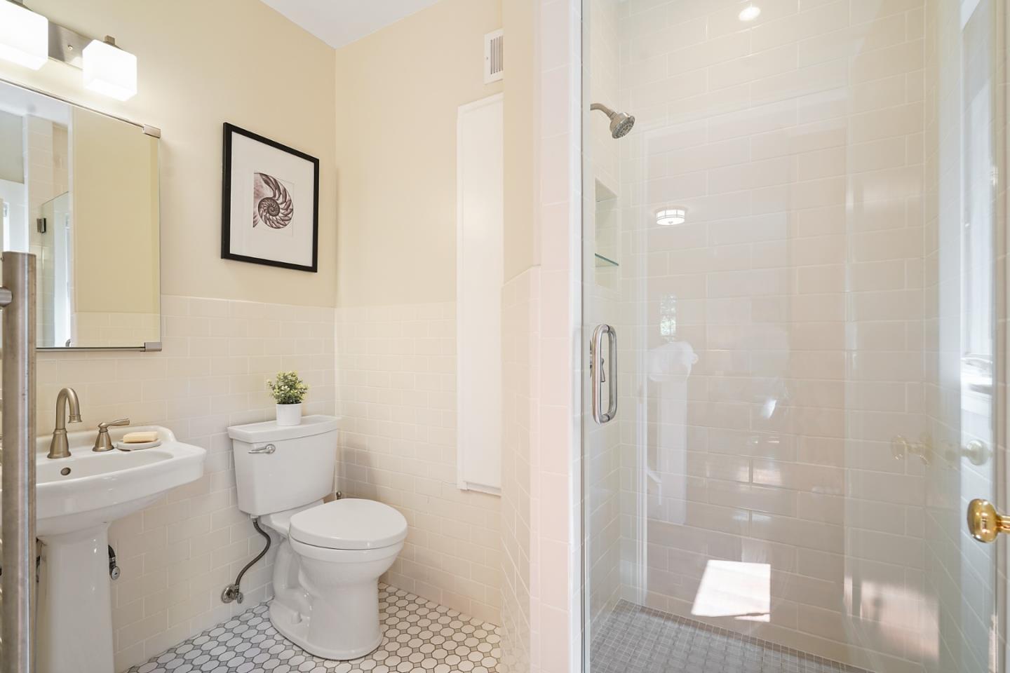 151 Melville Avenue Palo Alto, CA 94301 - Photo 29 of 51 a bathroom with a toilet sink and shower