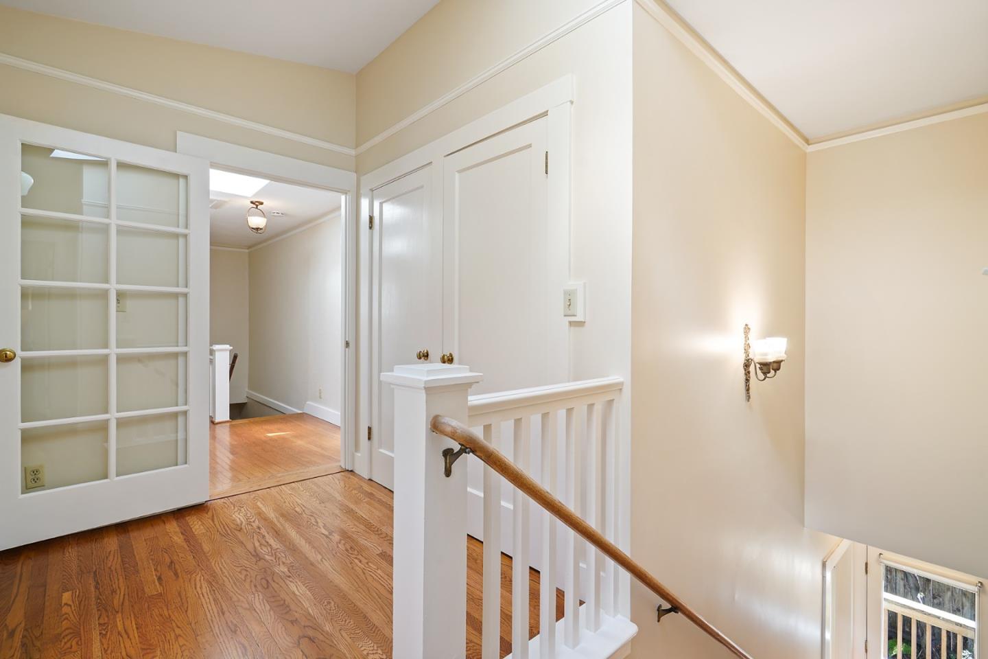 151 Melville Avenue Palo Alto, CA 94301 - Photo 30 of 51 a view of an empty room with wooden floor and a window