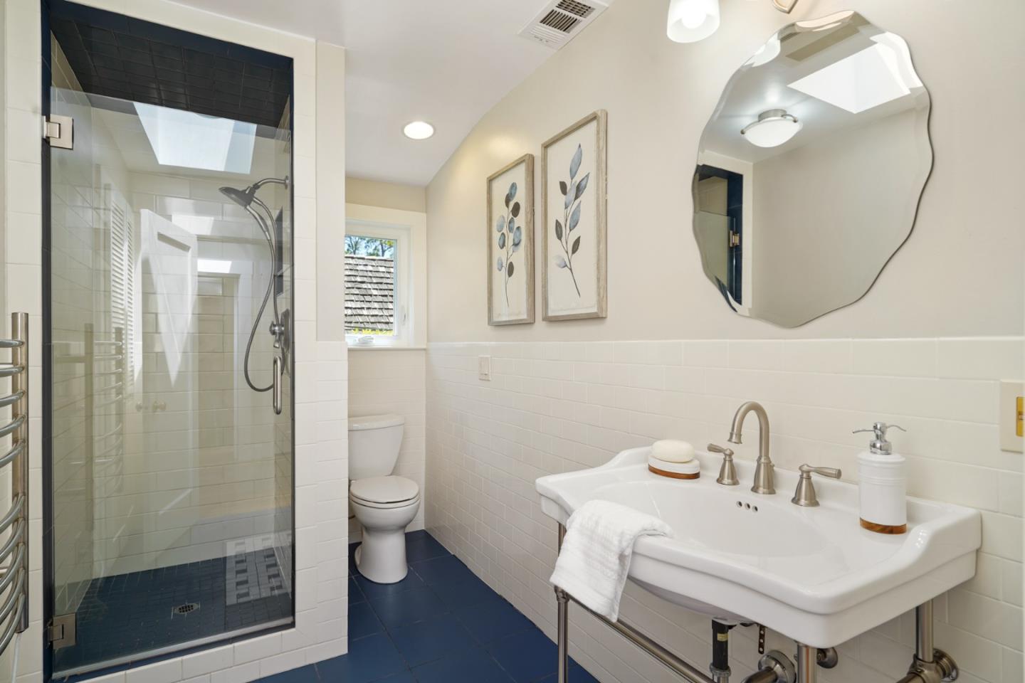 151 Melville Avenue Palo Alto, CA 94301 - Photo 33 of 51 a bathroom with a sink and a mirror