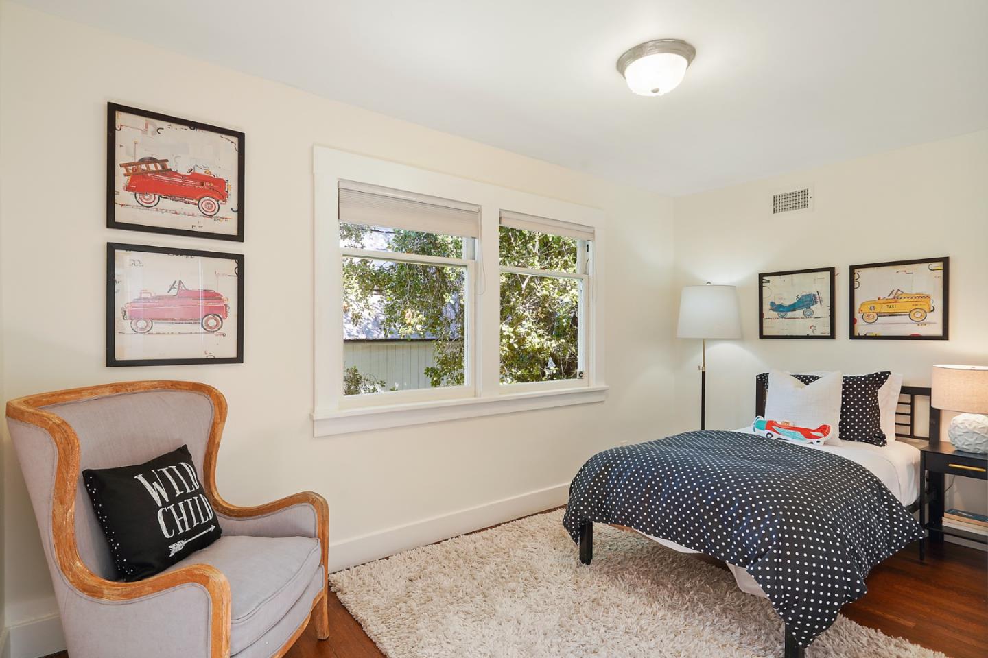 151 Melville Avenue Palo Alto, CA 94301 - Photo 34 of 51 a bedroom with a bed and wooden floor
