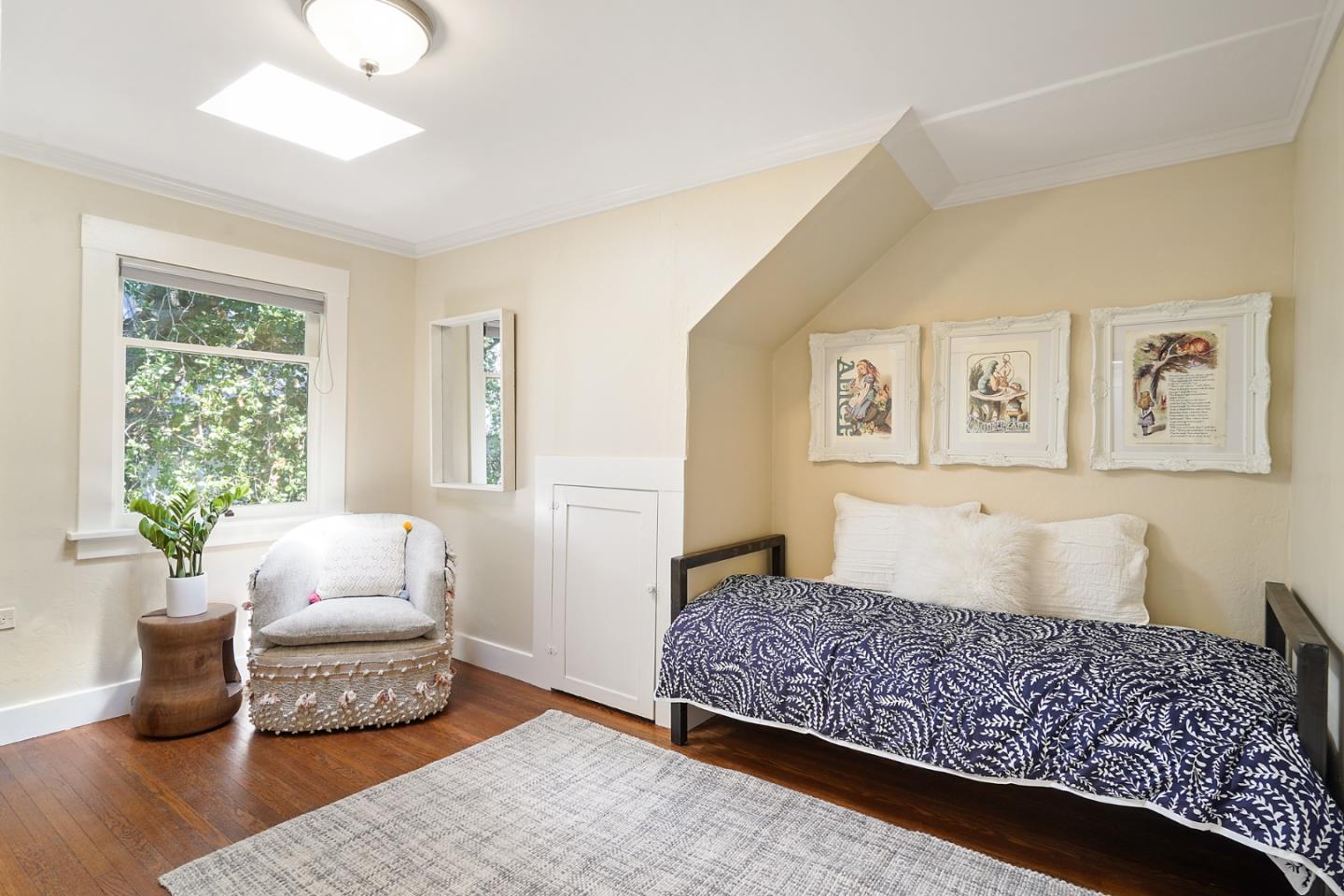 151 Melville Avenue Palo Alto, CA 94301 - Photo 35 of 51 a bedroom with a bed and wooden floor