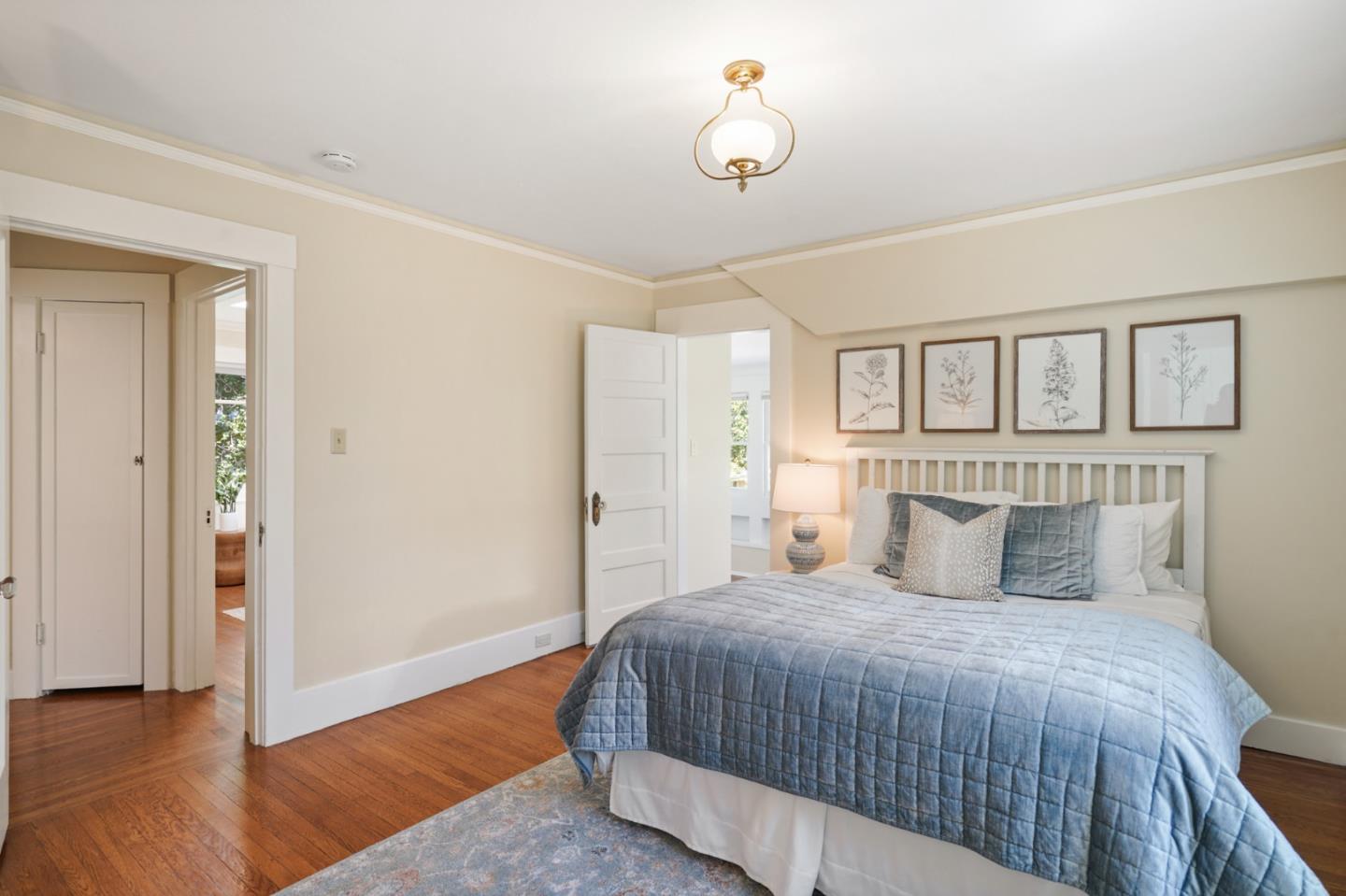 151 Melville Avenue Palo Alto, CA 94301 - Photo 38 of 51 a bedroom with a bed and wooden floor