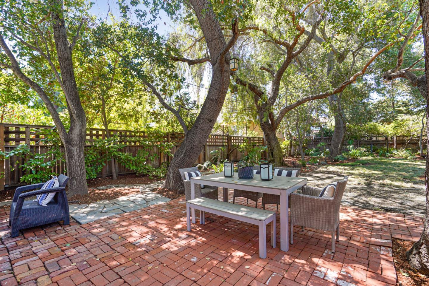 151 Melville Avenue Palo Alto, CA 94301 - Photo 45 of 51 a view of a backyard with sitting area