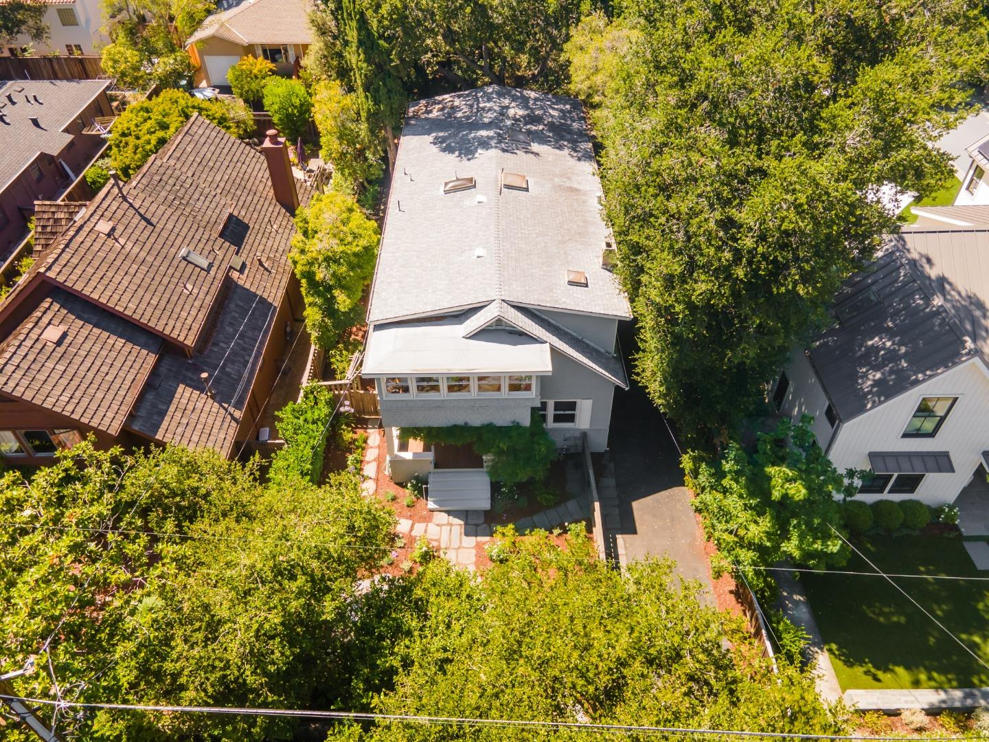 151 Melville Avenue Palo Alto, CA 94301 - Photo 49 of 51 a view of a house with a yard and garden