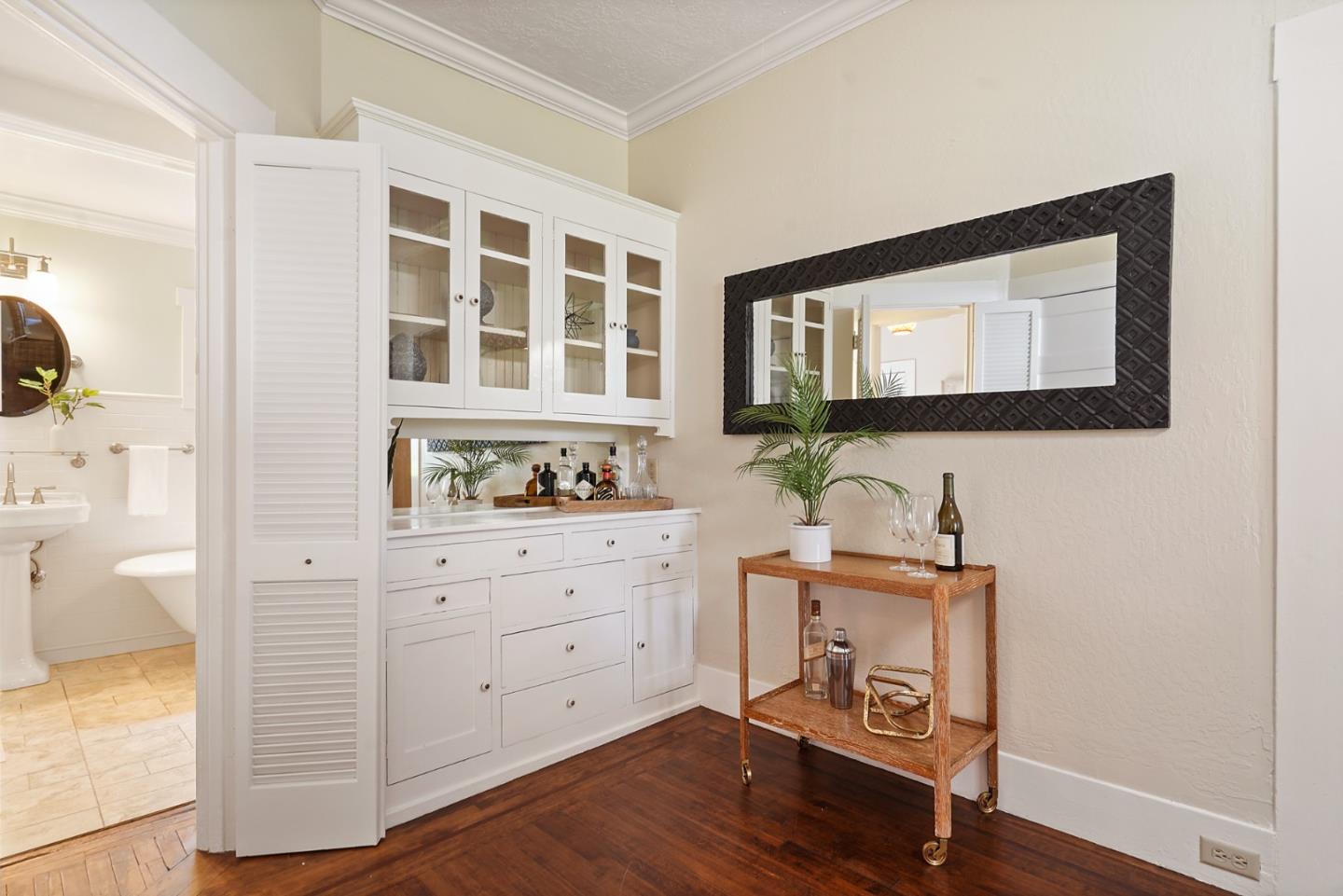 151 Melville Avenue Palo Alto, CA 94301 - Photo 10 of 51 a hallway with a dresser and a window