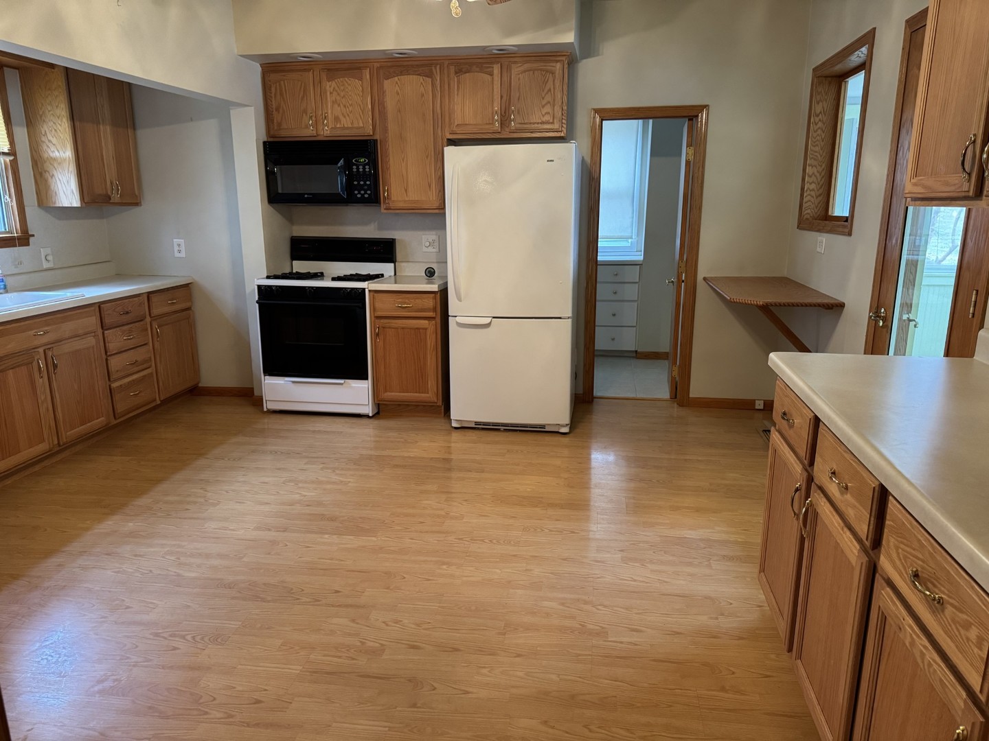 119 East 2nd Street Spring Valley, IL 61362 - Photo 5 of 10 a kitchen with stainless steel appliances a refrigerator stove and sink