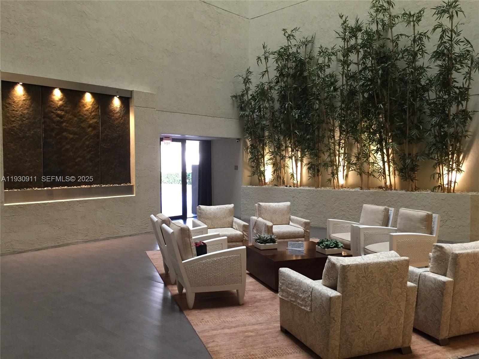 201 Crandon Boulevard, Unit 341 Key Biscayne, FL 33149 - Photo 24 of 25 a outdoor living space with furniture and a potted plant