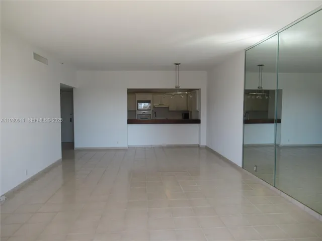 an empty room with a bathroom