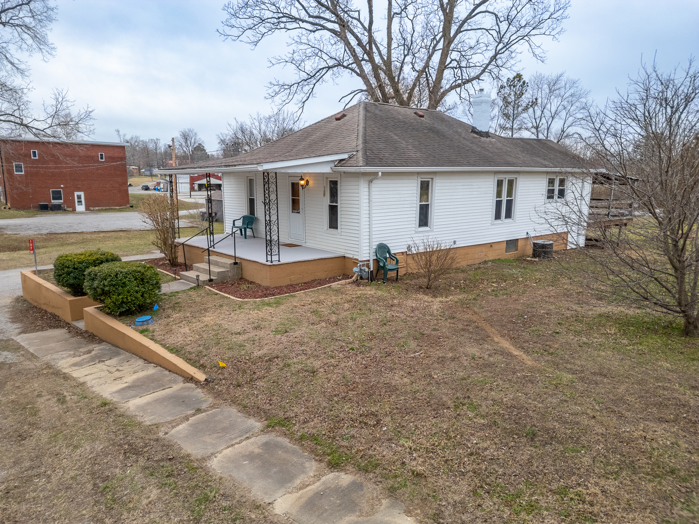 107 Seminary Street Creal Springs, IL 62922 - Photo 14 of 43 a view of a house with backyard and a tree