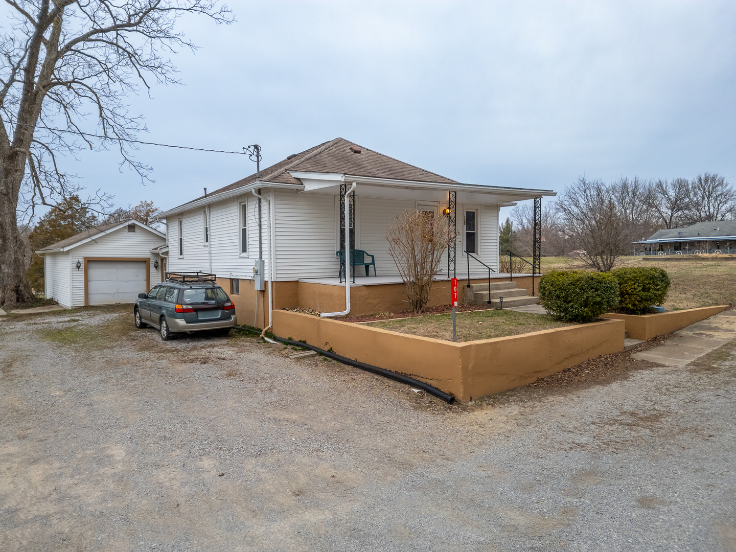 107 Seminary Street Creal Springs, IL 62922 - Photo 15 of 43 a front view of a house with a yard