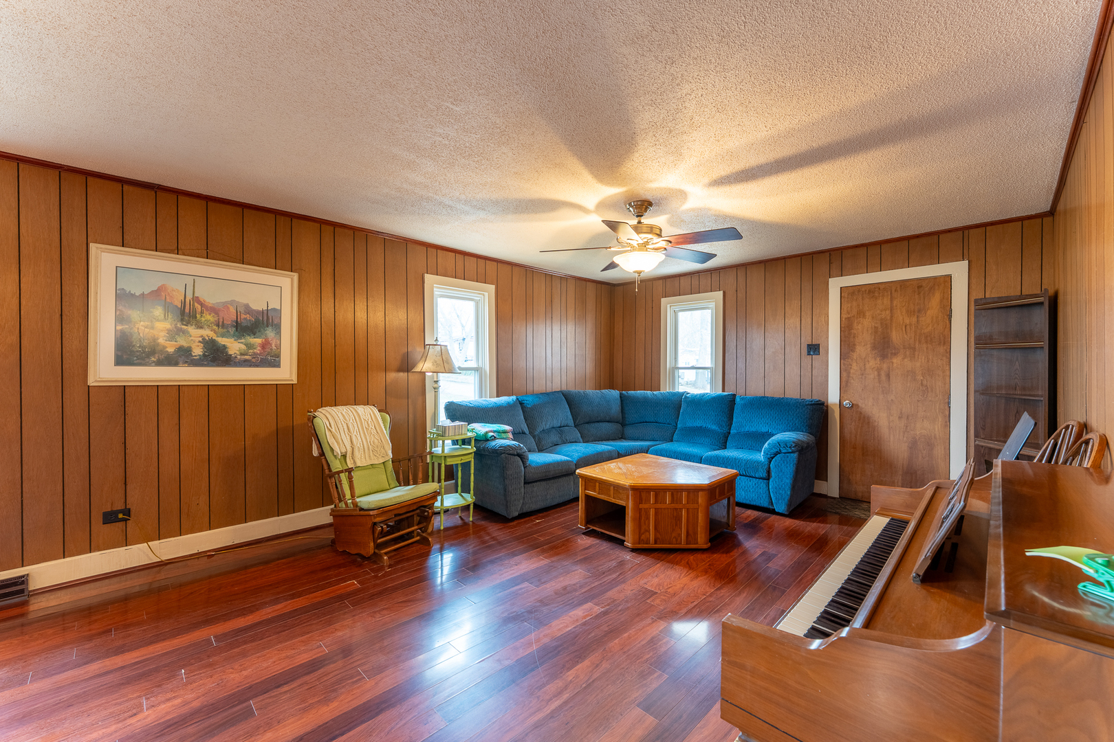 107 Seminary Street Creal Springs, IL 62922 - Photo 16 of 43 a living room with furniture and wooden floor