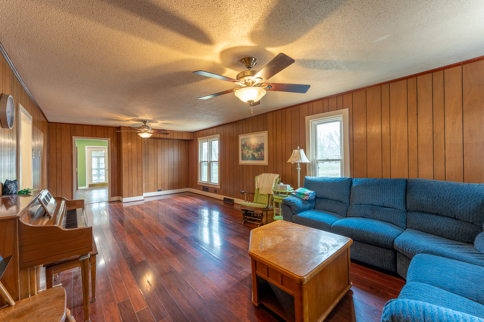 107 Seminary Street Creal Springs, IL 62922 - Photo 17 of 43 a living room with furniture a ceiling fan and a window