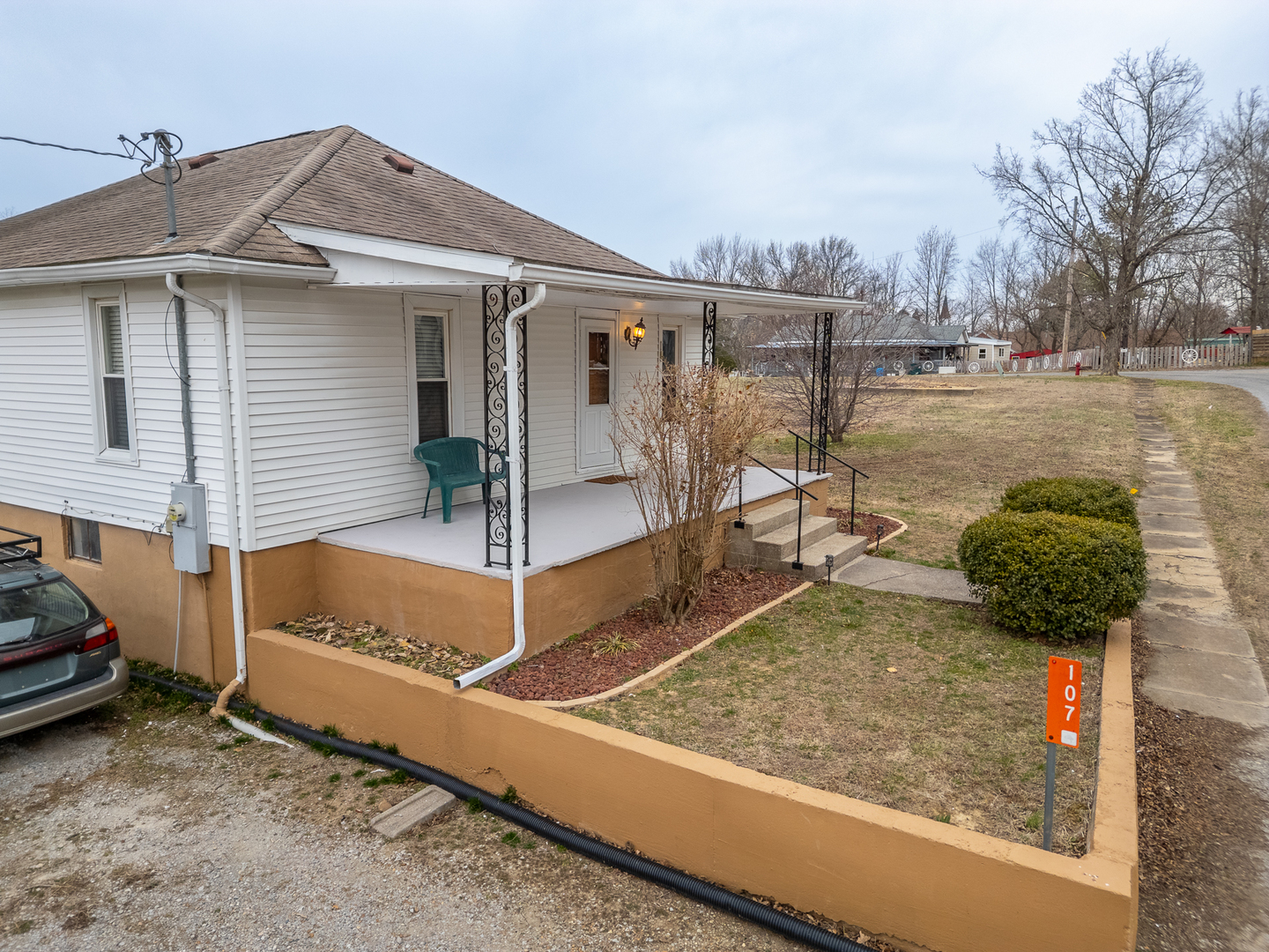 107 Seminary Street Creal Springs, IL 62922 - Photo 2 of 43 a view of a house with backyard and chair