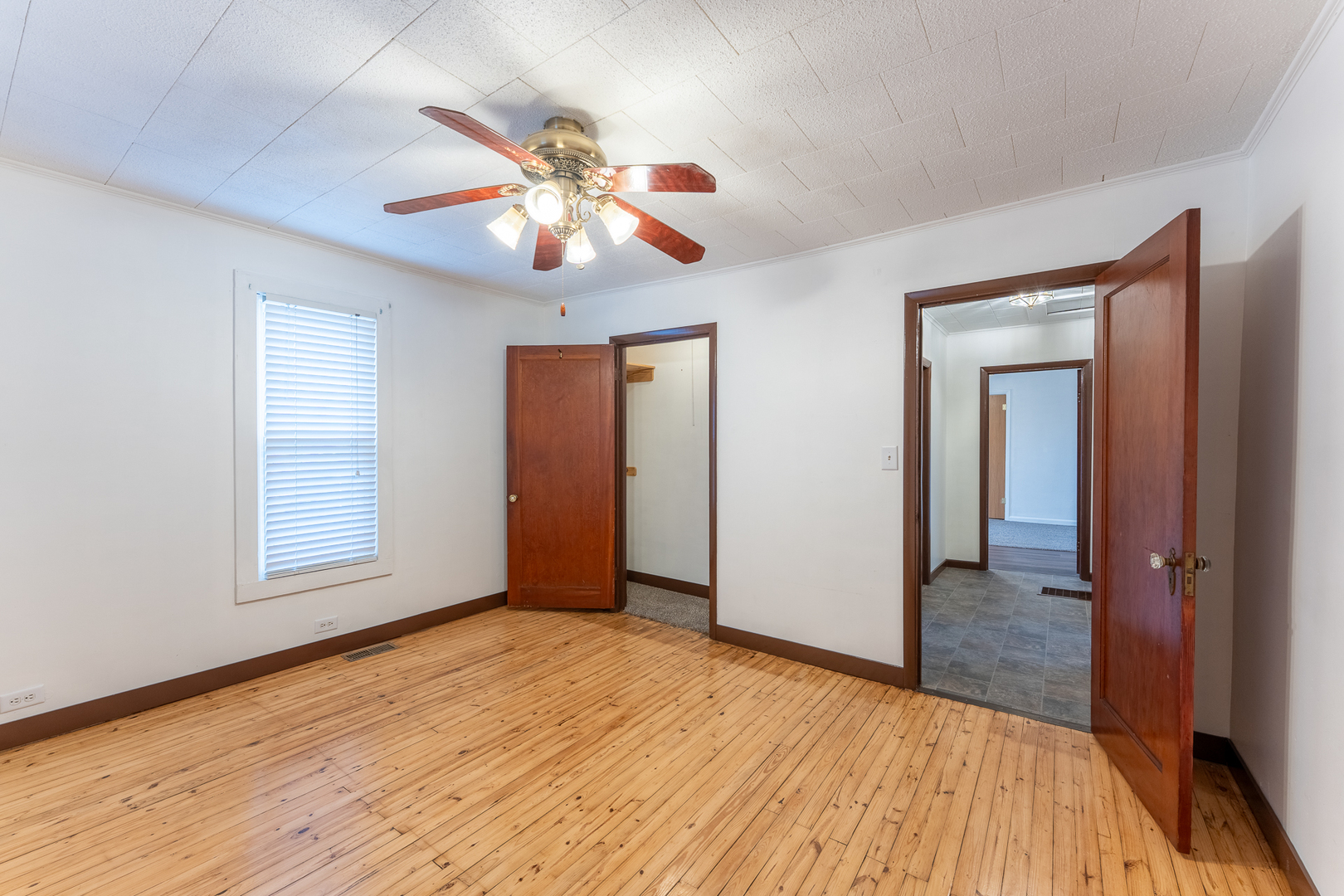 107 Seminary Street Creal Springs, IL 62922 - Photo 23 of 43 a view of empty room with wooden floor