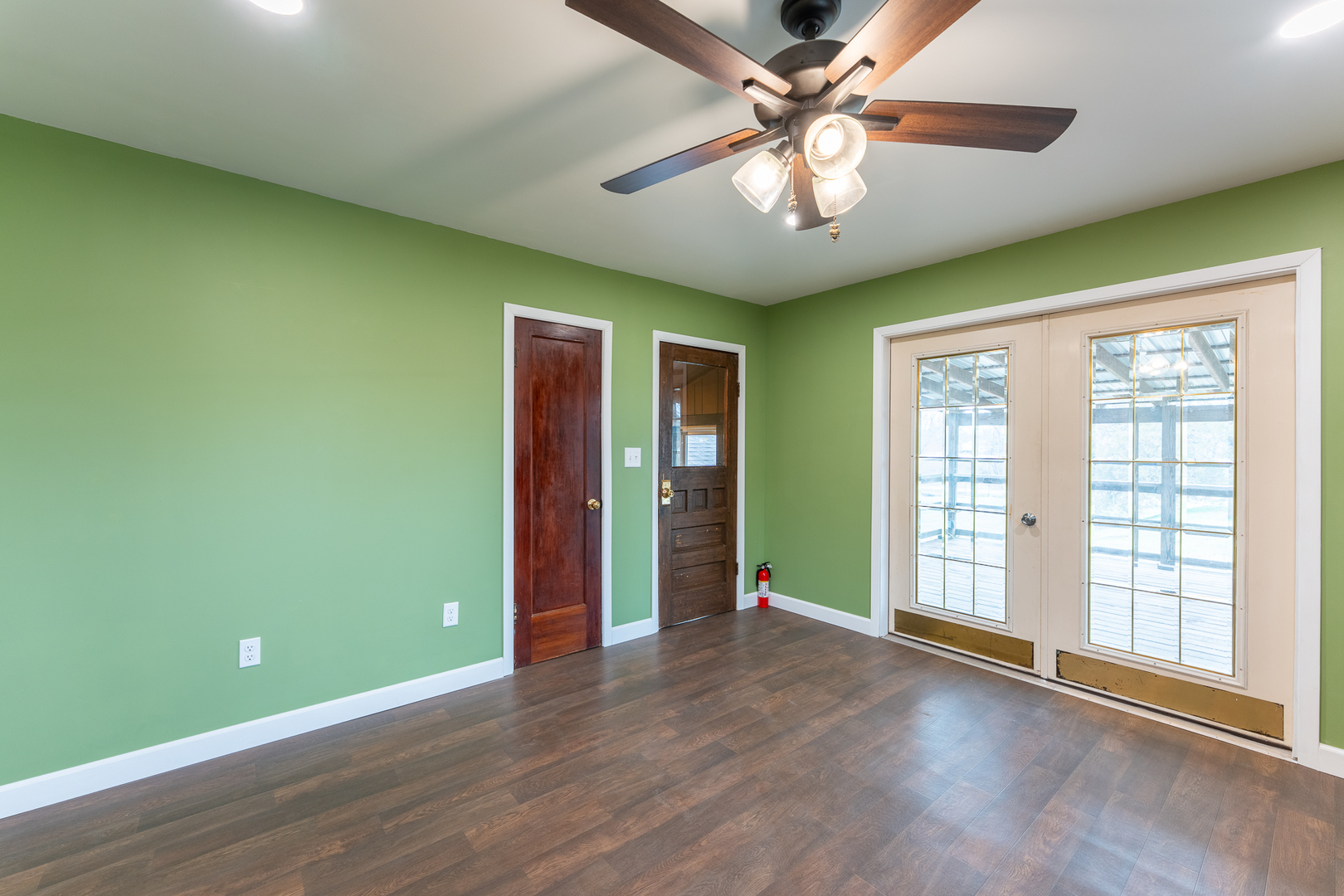 107 Seminary Street Creal Springs, IL 62922 - Photo 33 of 43 a view of an empty room with window chandelier fan