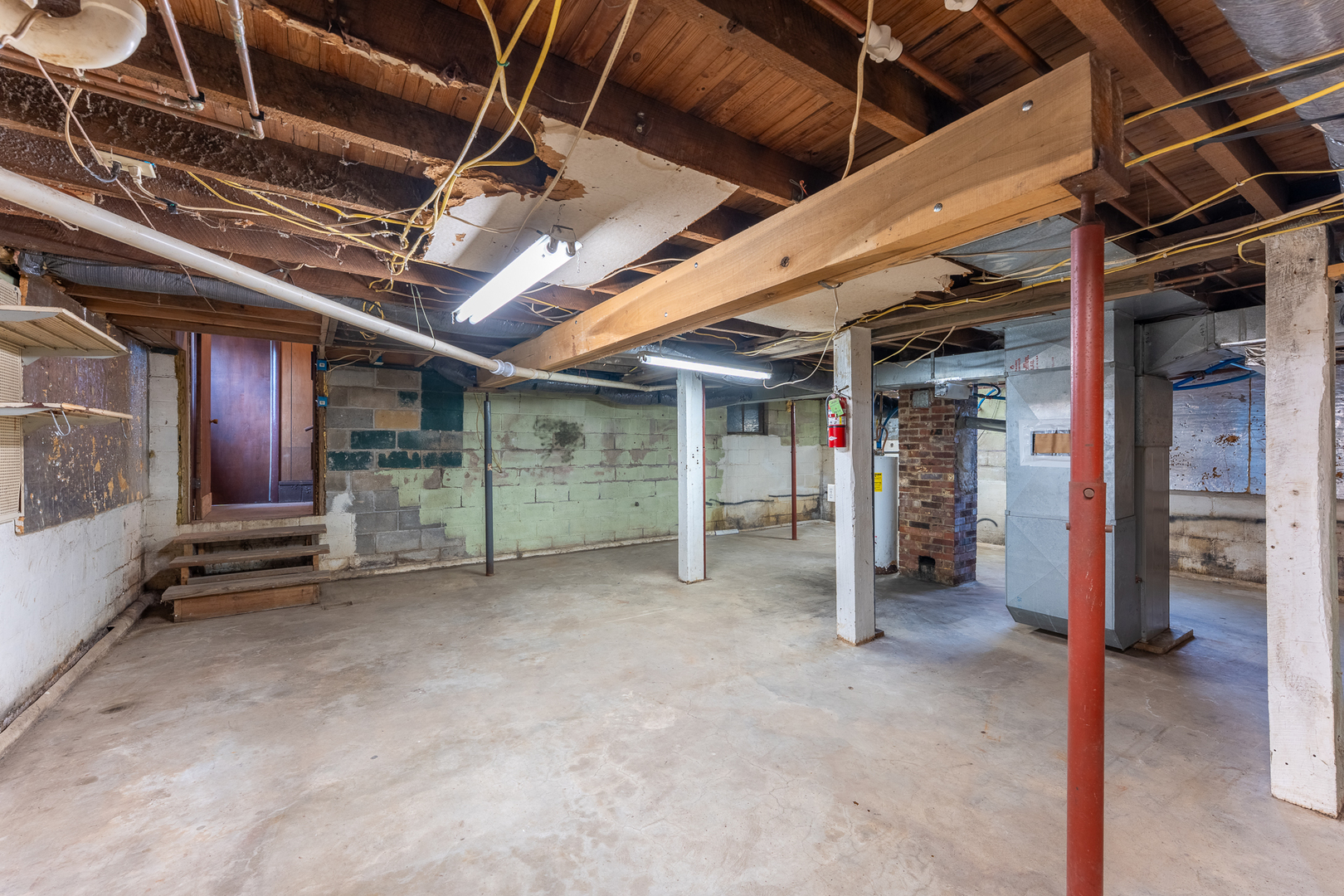 107 Seminary Street Creal Springs, IL 62922 - Photo 36 of 43 a view of empty room with wooden ceiling
