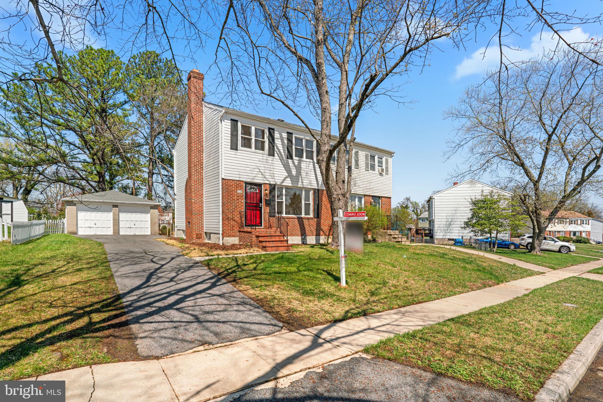 7134 Bexhill Road Windsor Mill, MD 21244 - Photo 2 of 34 a view of a house with a yard
