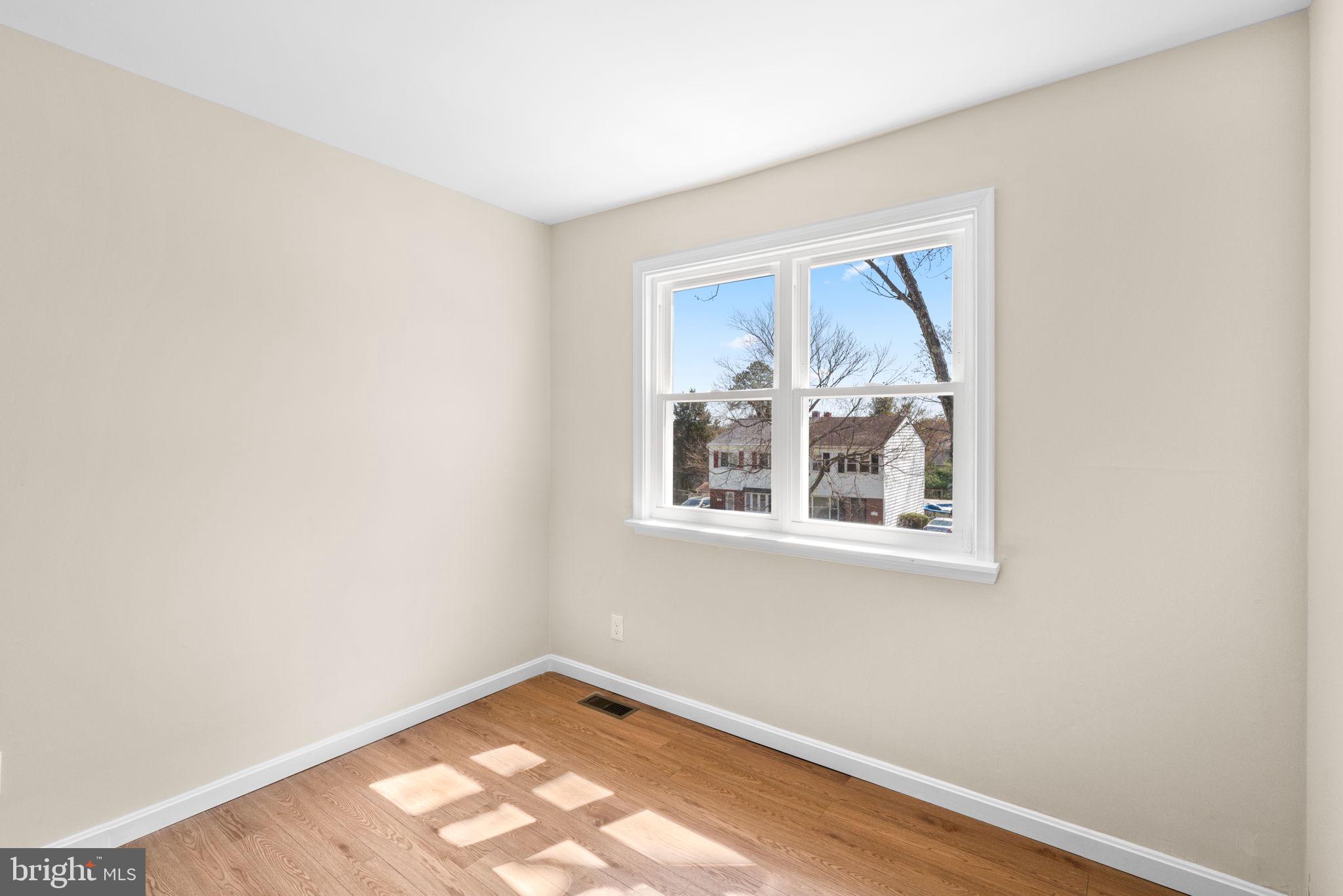 7134 Bexhill Road Windsor Mill, MD 21244 - Photo 22 of 34 an empty room with a window