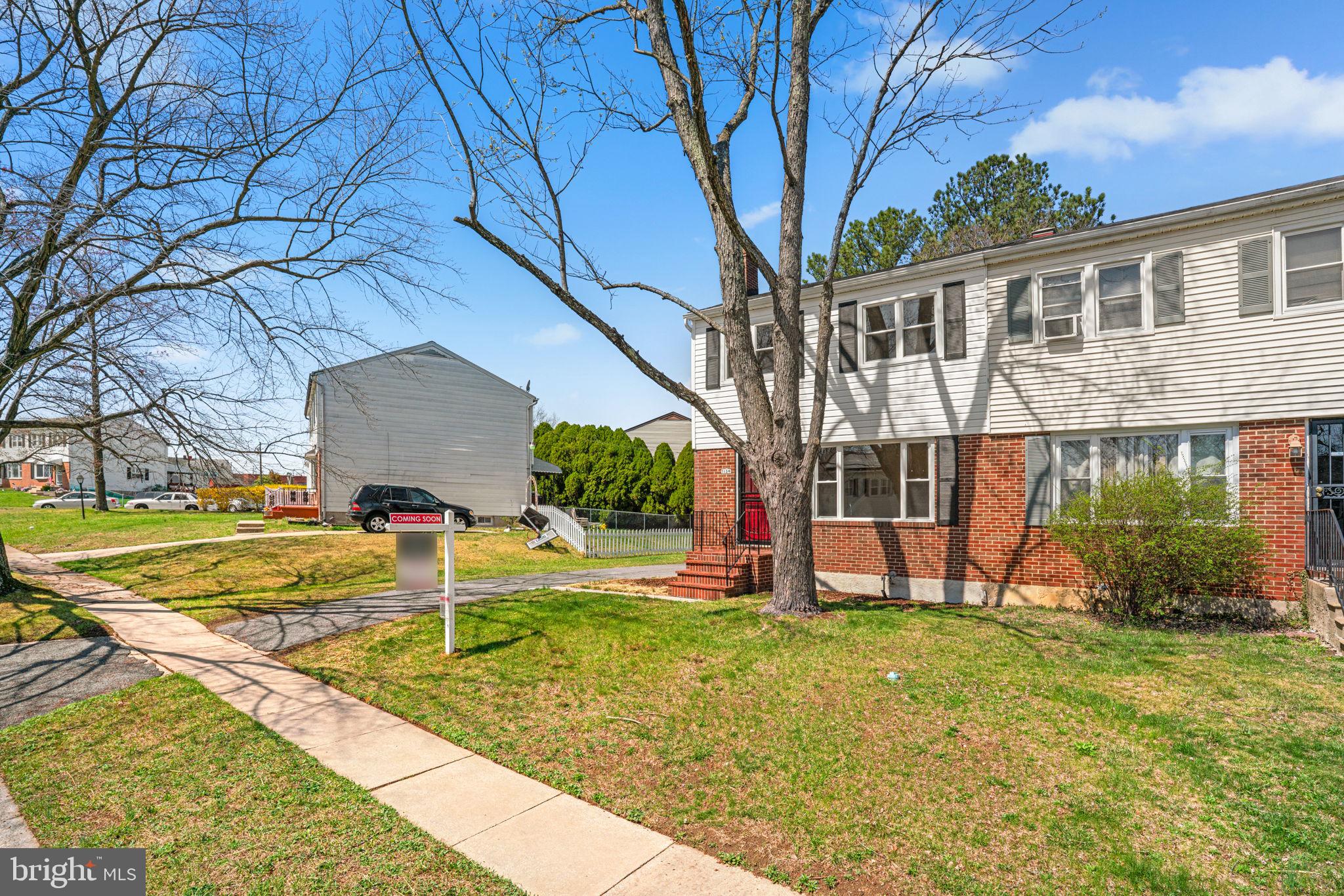 7134 Bexhill Road Windsor Mill, MD 21244 - Photo 34 of 34 a view of an house with backyard and a tree