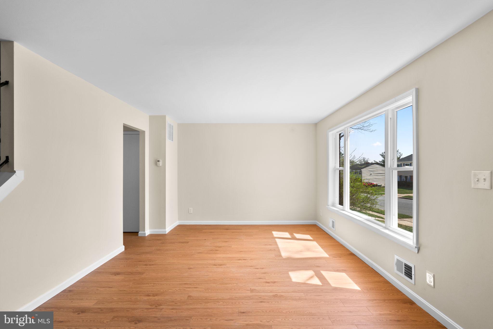 7134 Bexhill Road Windsor Mill, MD 21244 - Photo 8 of 34 a view of an empty room with a window