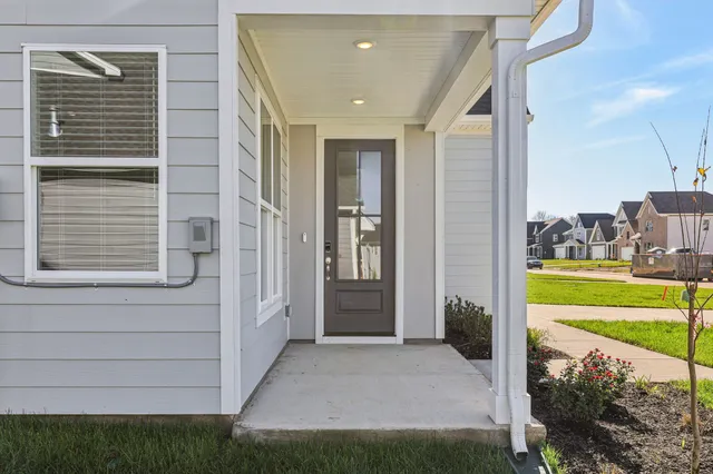 a view of a porch with a yard