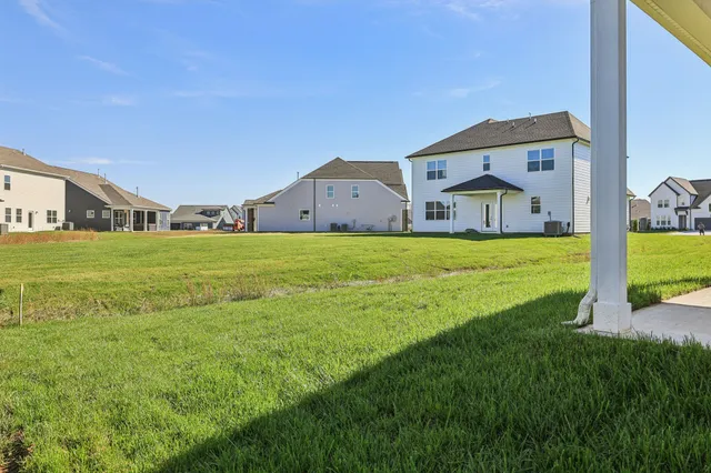 a front view of house with yard