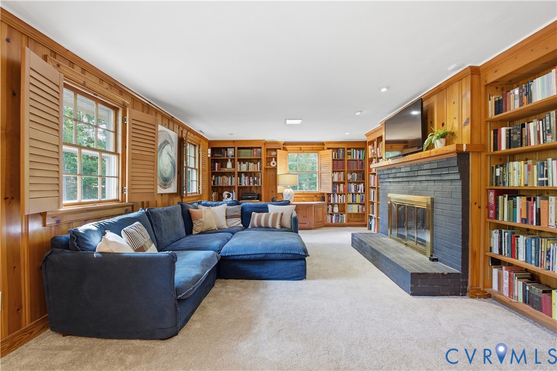 6405 Buckhill Road Richmond, VA 23225 - Photo 30 of 71 Expansive room featuring wood paneling, built-in b