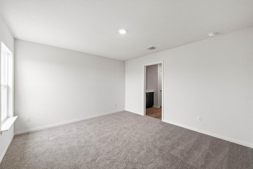 9964 Voyager Lane Fort Worth, TX 76131 - Photo 5 of 10 a view of an empty room with a window